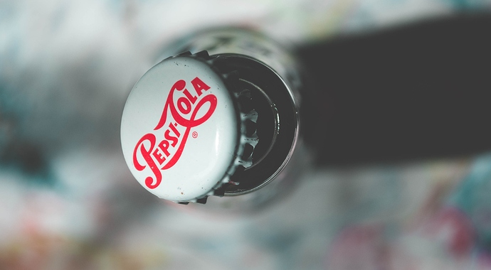 shallow-focus-photography-of-pepsi-cola-bottle-cap-988952